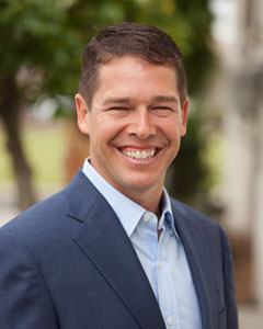 A headshot of Dr. John C. Theriot of Theriot Family Dental Care in Baton Rouge, Louisiana.