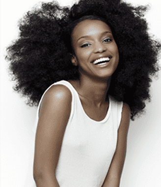 Young black woman smiling - for information on teeth whitening in Baton Rouge
