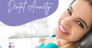 Woman Smiling in Dental Chair Minimizing Dental Anxiety