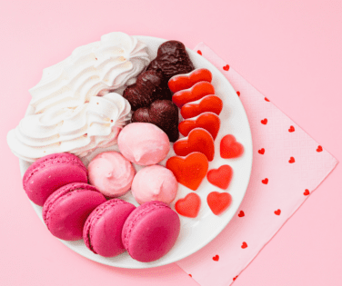 Plate of White Pink Red Valentine Treats Cookies and Candy