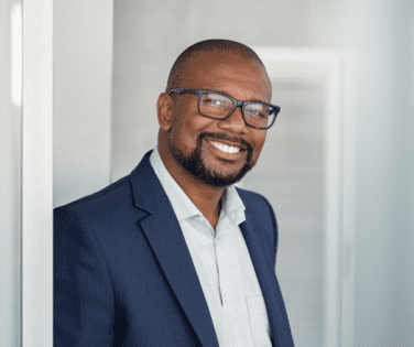 Man Wearing Glasses Smiling