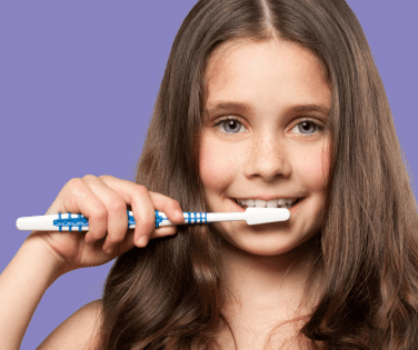 Young Girl Brushing Teeth 