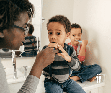 Family brushing teeth